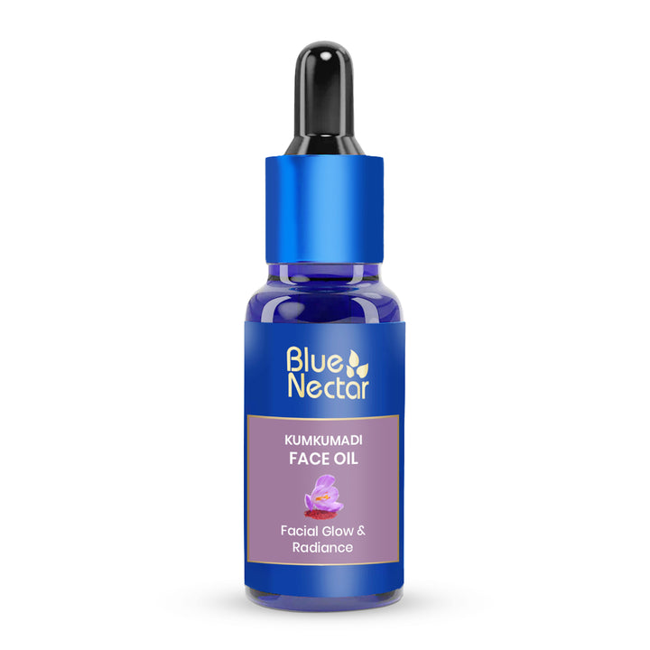 Kumkumadi Serum bottle with a blue cap and dropper.