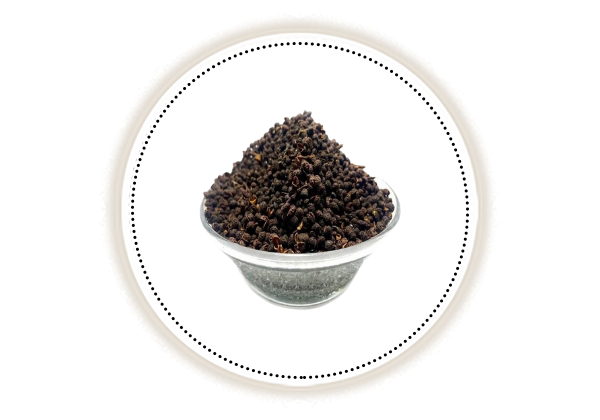 Tumbru seeds in a bowl on white background