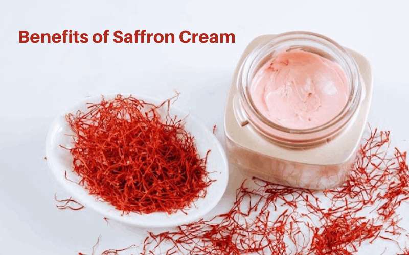 Saffron cream with bowl of saffron threads are on table 