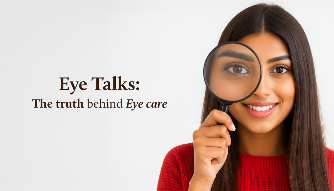 A woman holds a magnifying glass up to her left eye, enlarging it playfully.