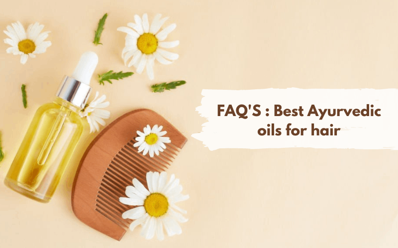 bhringraj oil, wooden comb and white flowers are on skin background 