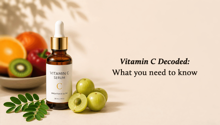 A bottle labeled “Vitamin C Serum” is shown with fruits like kiwi, orange, and gooseberry, next to text reading “Vitamin C Decoded: What you need to know.”.