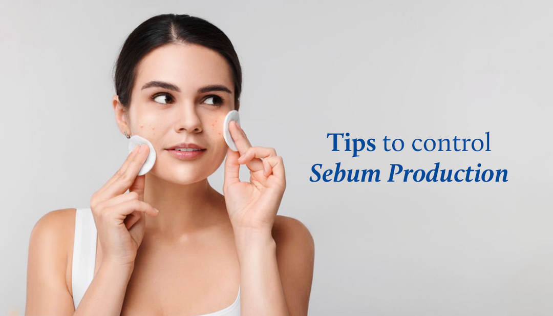 Lady holding cotton pads against both cheeks to absorb excess facial oil.
