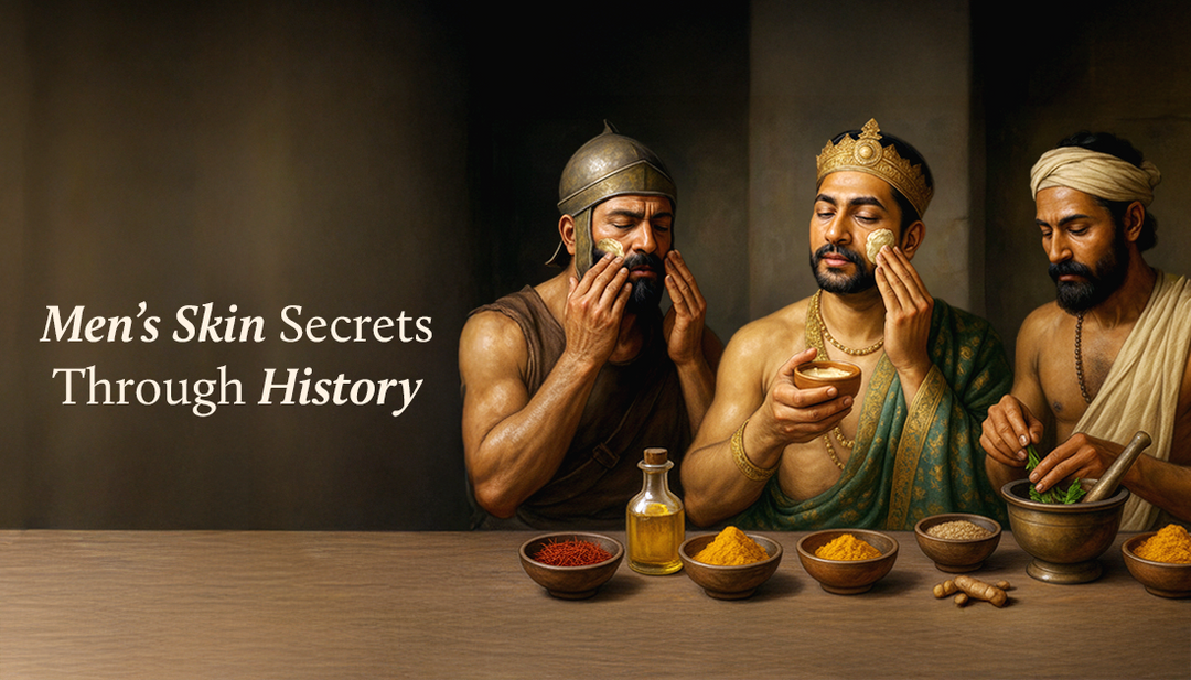 In an old, ancient setting, three men sit together—two applying a herbal lepa to their faces, while the third mixes the paste. A wooden table nearby is filled with natural ingredients.