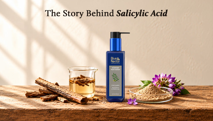 Sunlit still life titled “The Story Behind Salicylic Acid,” featuring a skincare bottle, herbal tea, tree bark, powdered ingredients, and purple flowers.