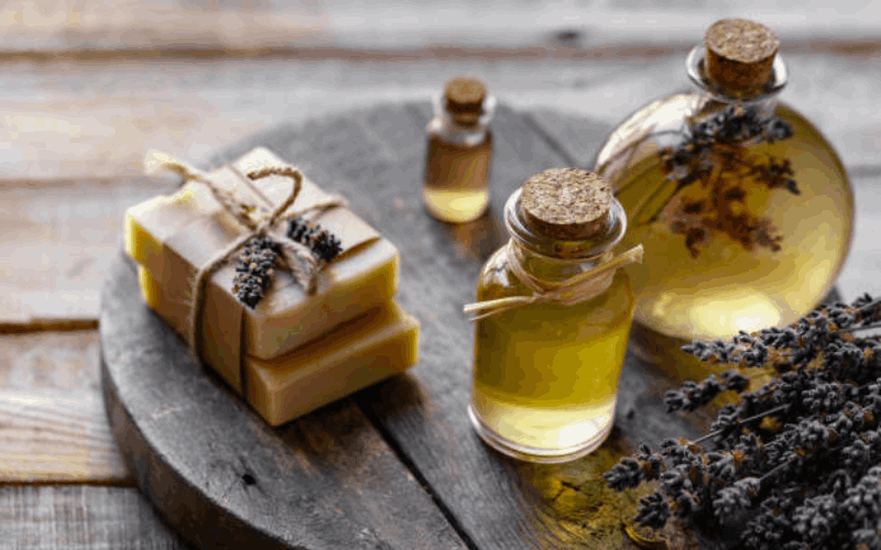 Nalpamradi oil vessel with other 3 vessel and soaps are placed on wooden table