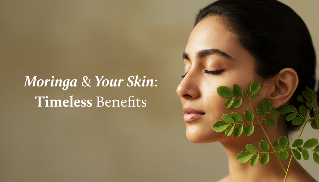 The left side of a woman’s face is shown with her eyes closed, and fresh moringa leaves are gently placed on her cheek.