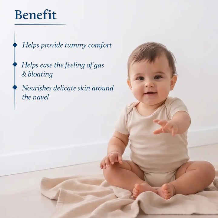 A baby sitting on a cream blanket on a light floor against a white wall, wearing a light beige short-sleeve bodysuit. On the left, text lists benefits including tummy comfort, gas and bloating relief, and skin nourishment.