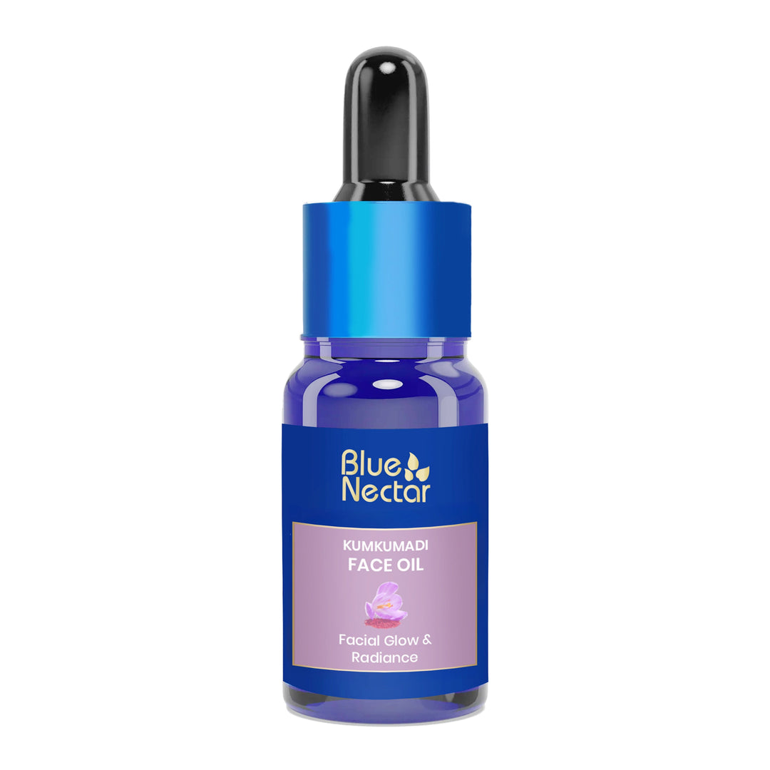 Kumkumadi Face serum bottle with a blue cap and dropper.