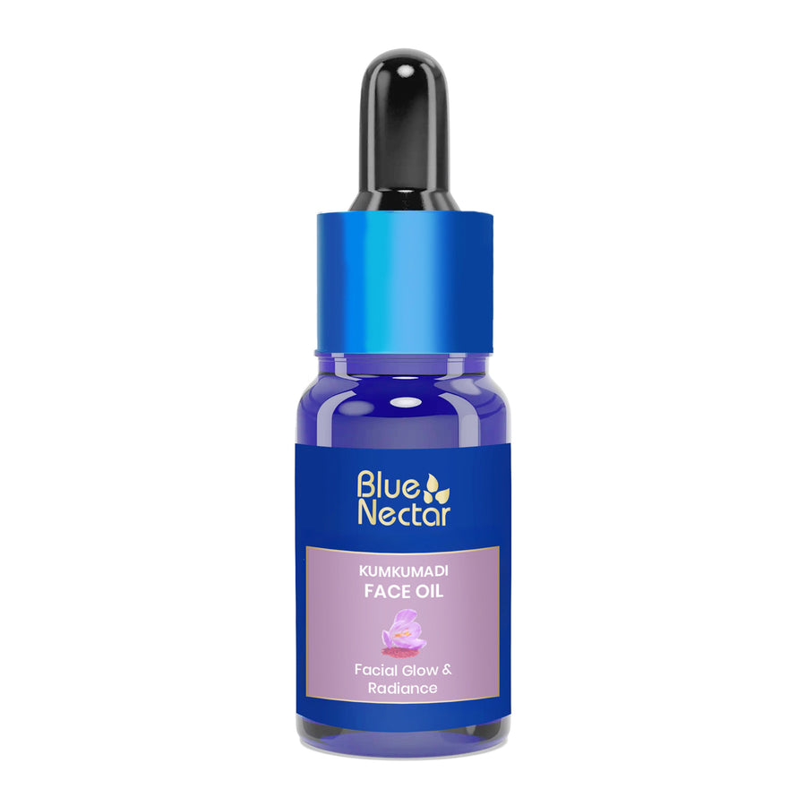 Kumkumadi Face serum bottle with a blue cap and dropper.